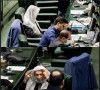 بیژن نوباوه با روسری در صحن علنی مجلس حاضر شد | عکس